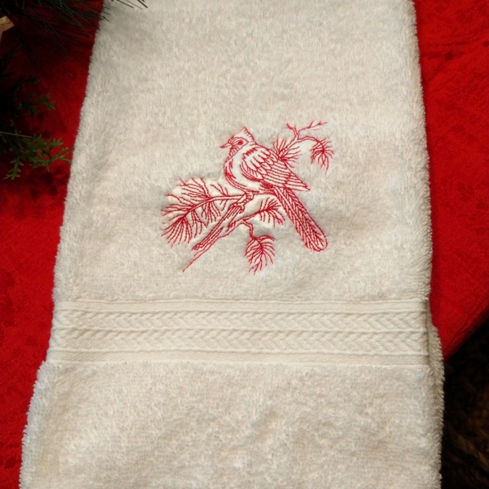 White embroidered Cardinal hand towel